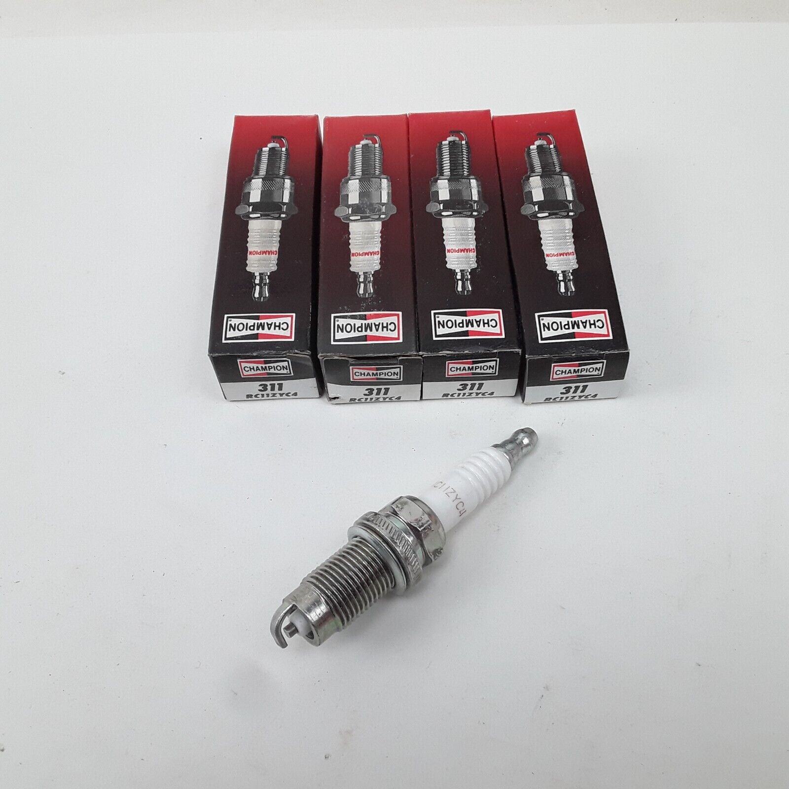 Set 4 Champion 311 RC11ZYC4 Spark Plug Fits Dodge Pontiac Chrysler Jeep Cadillac