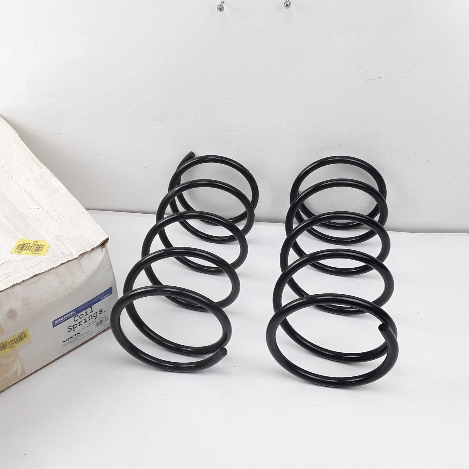 MOOG 80898 Front Coil Spring Set Assembly Black Fits Nissan Altima (2000-2001)