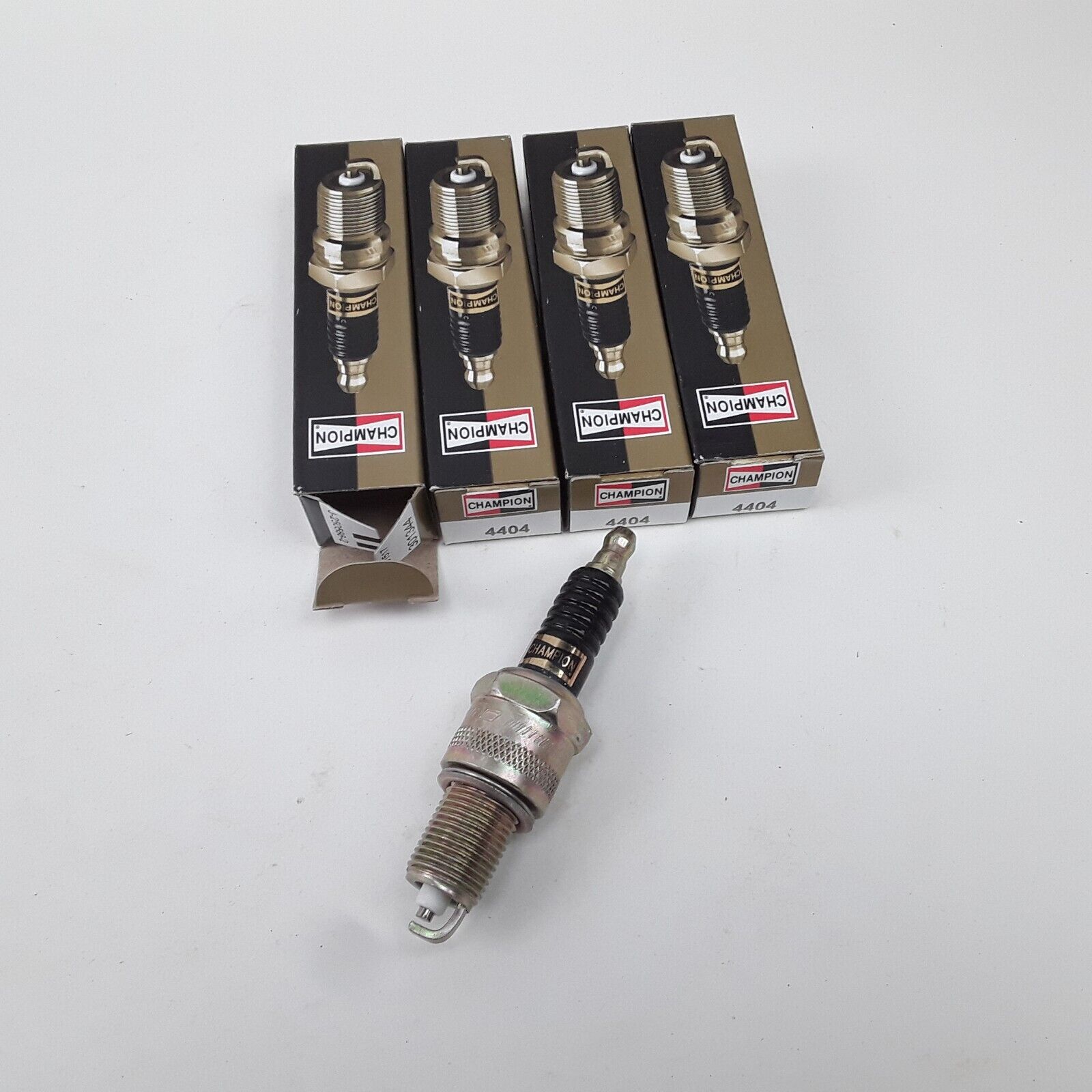 4 pc Champion 4404 Spark Plug Fits GMC Ford Dodge Datsun Toyota Nissan Chevrolet