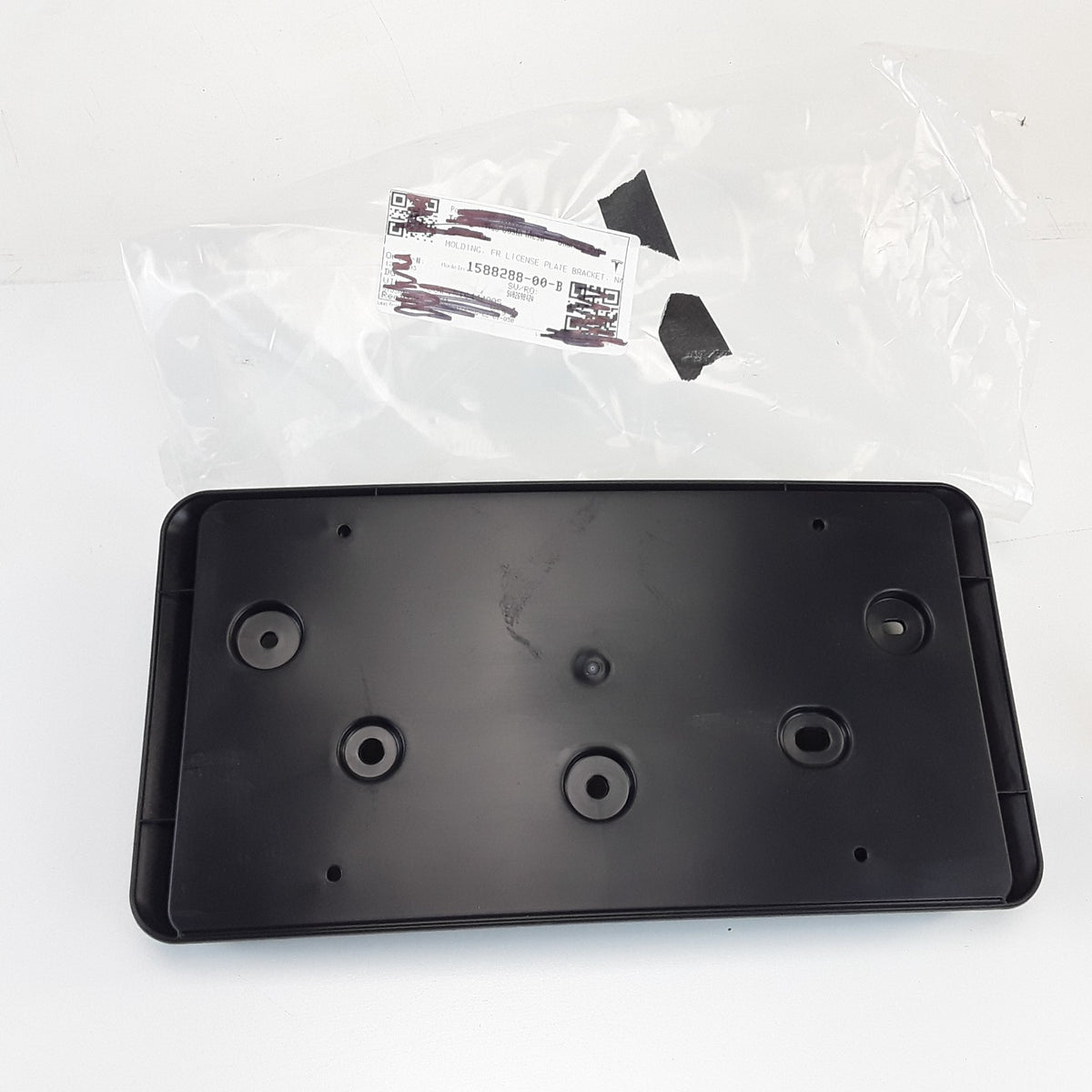1588288-00-B Front License Plate Bracket Molding For Tesla Model S 2021-2025 OEM