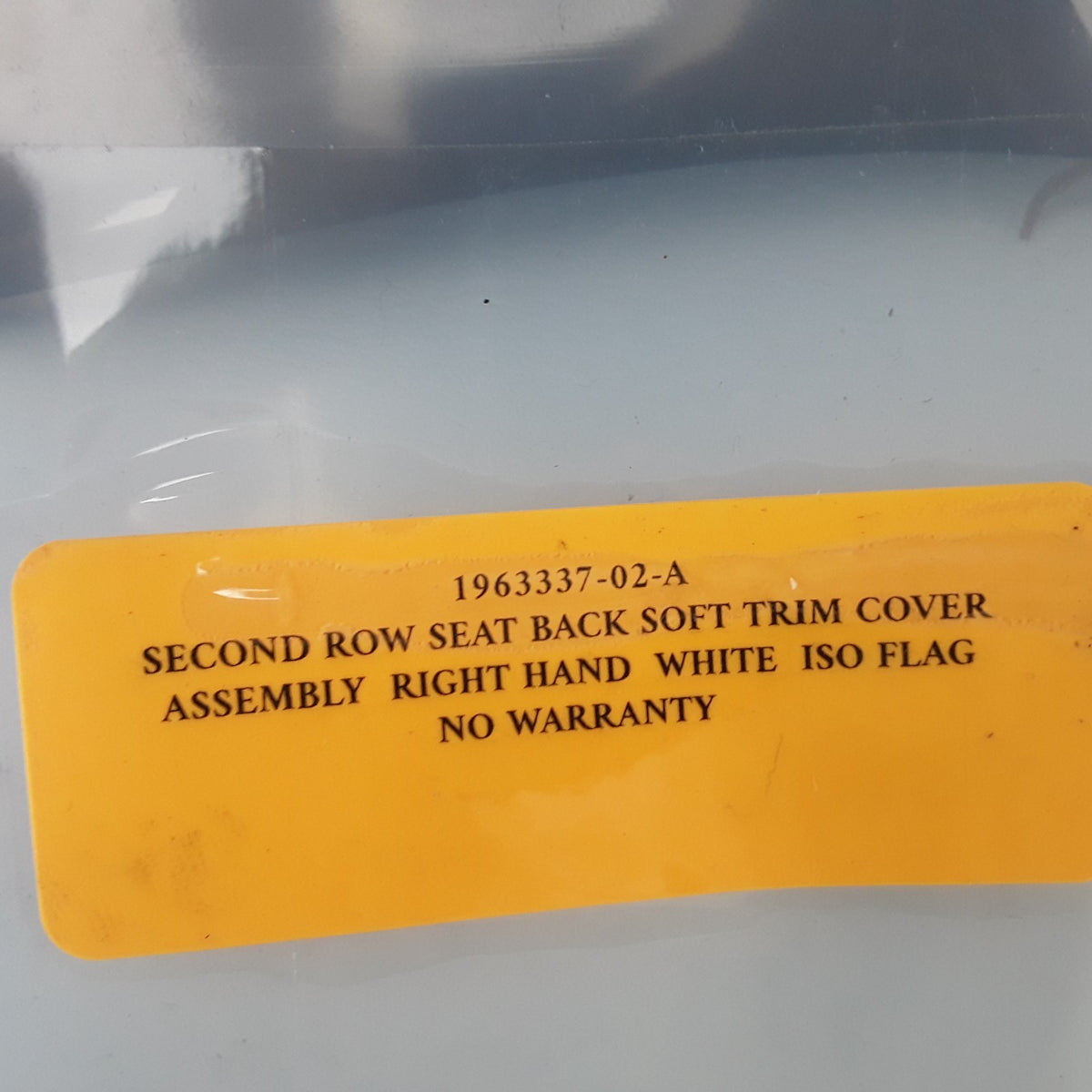 1963337-02-A Right White ISO Flag 2nd Row Seat Back Cover For Tesla Model Y OEM