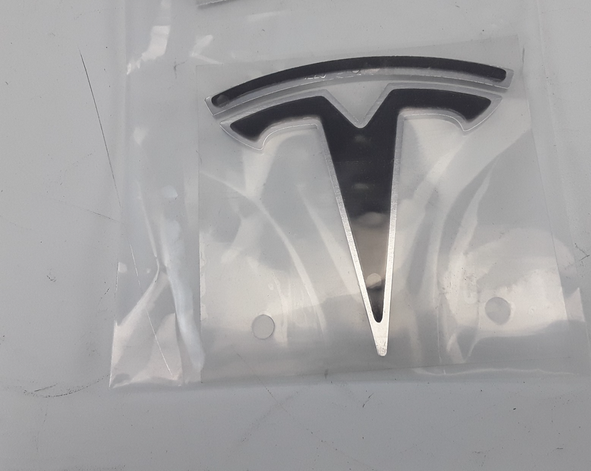 Model S 2012-2016 Front Tesla T Badge 1017442-00-B Genuine OEM