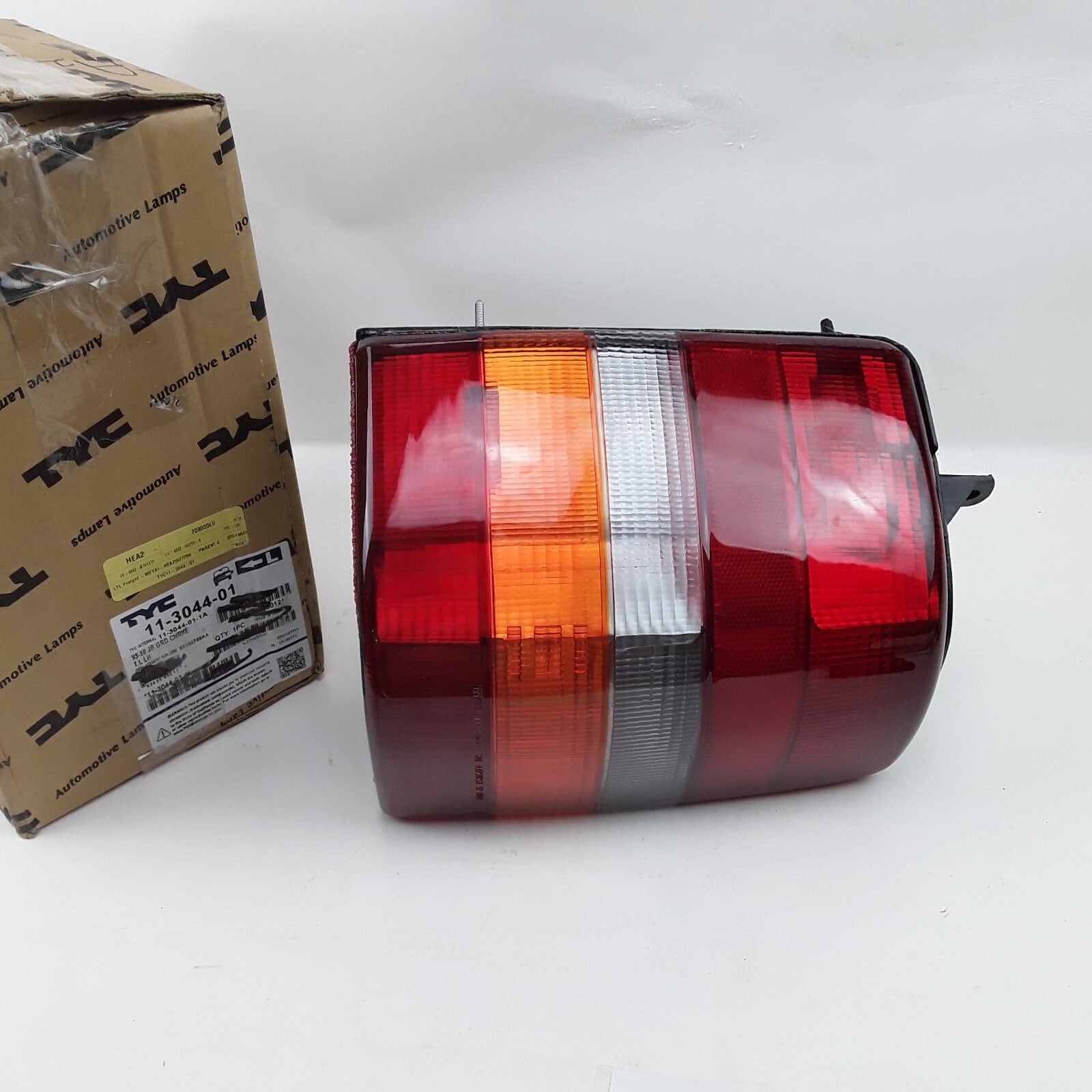 TYC 11-3044-01 Left Tail Light Assembly Fits Jeep Grand Cherokee (1993-1998)