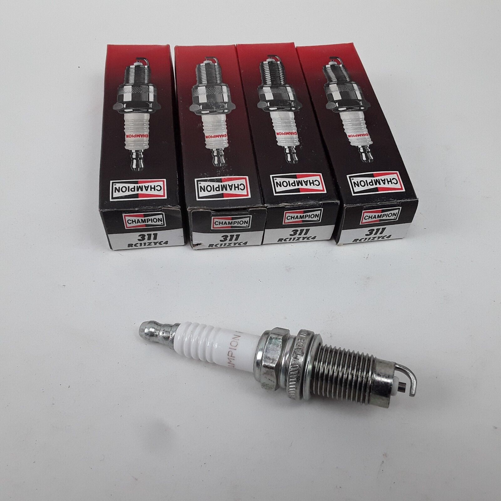 Set 4 Champion 311 RC11ZYC4 Spark Plug Fits Dodge Pontiac Chrysler Jeep Cadillac