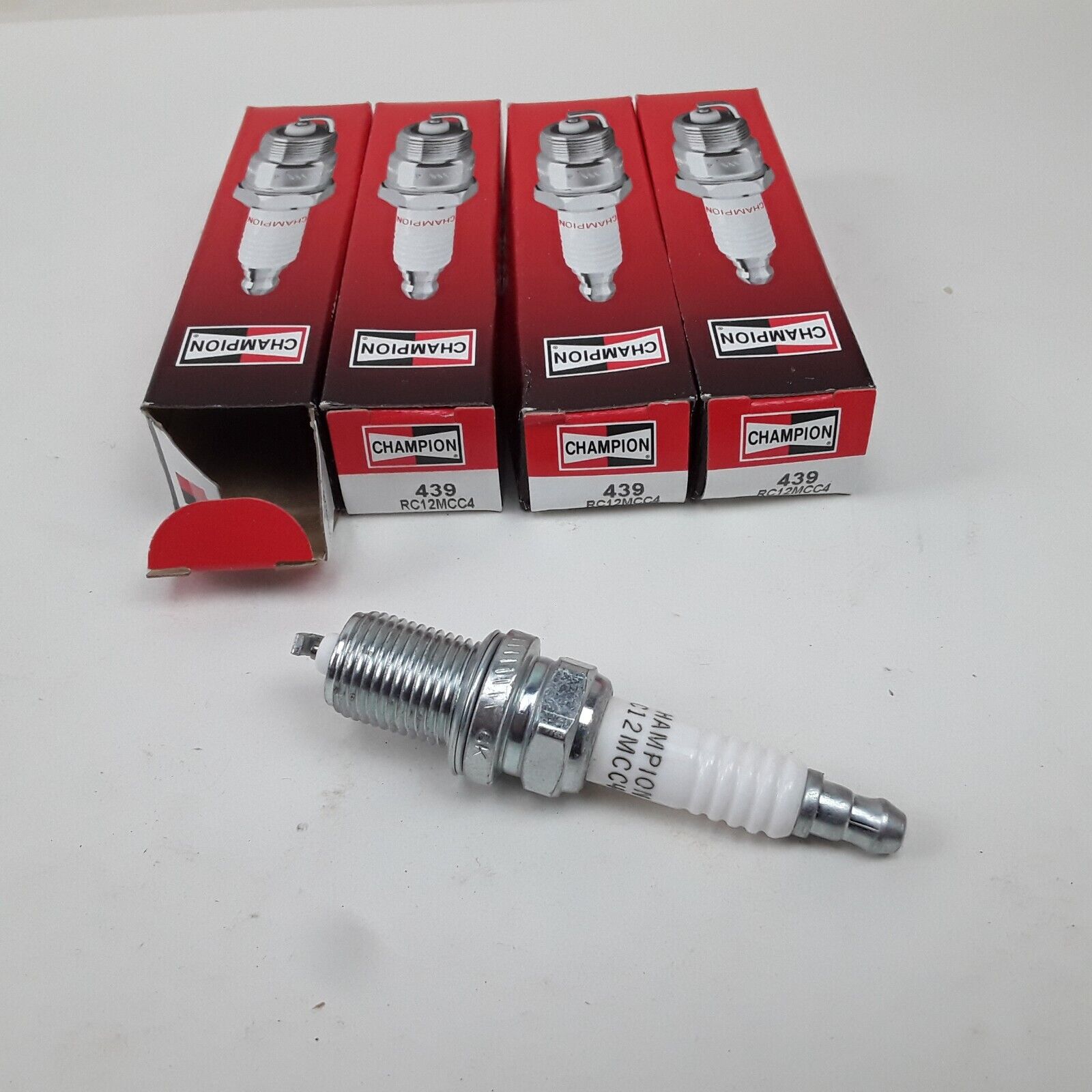 4 pcs Champion RC12MCC4 Spark Plug Fits Dodge Jeep Chrysler Toyota Polaris