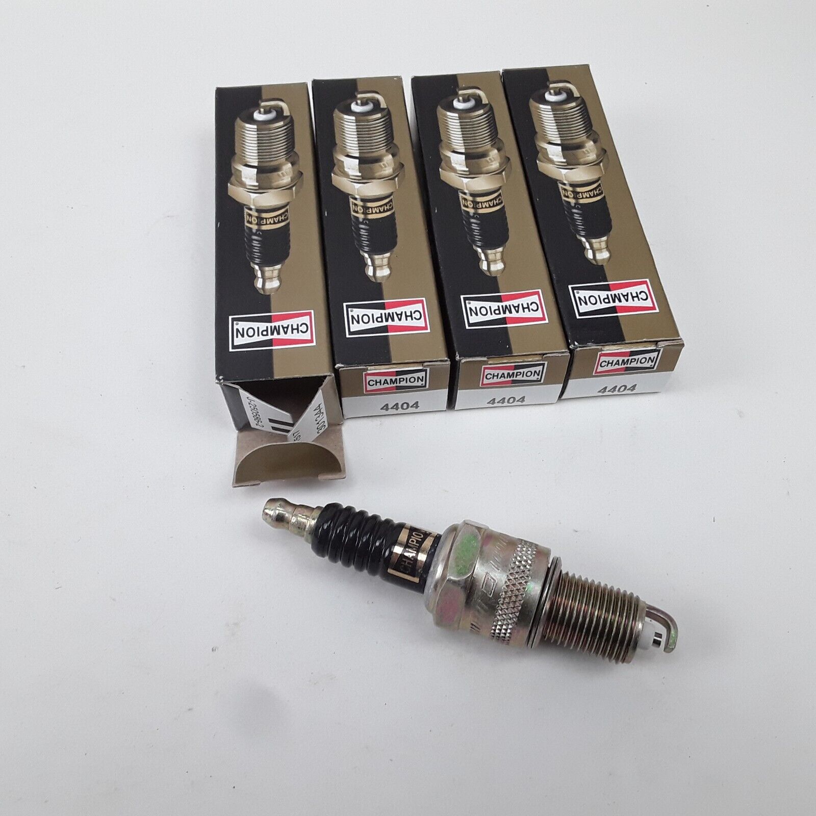 4 pc Champion 4404 Spark Plug Fits GMC Ford Dodge Datsun Toyota Nissan Chevrolet