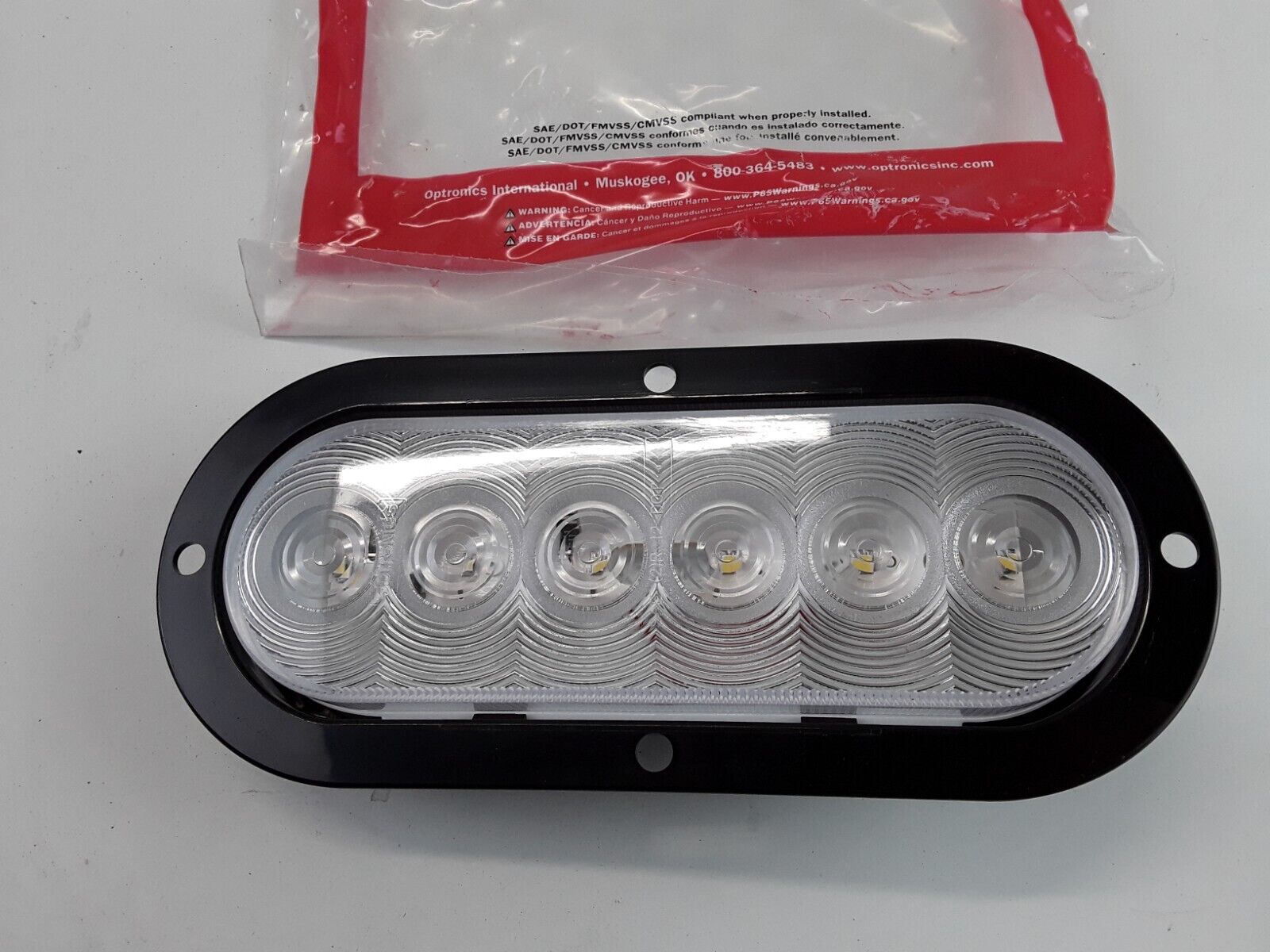 Trailer Truck Clear 6" Oval LED Back-Up Light, White Sealed Optronics BUL12CFBP - HotCarParts