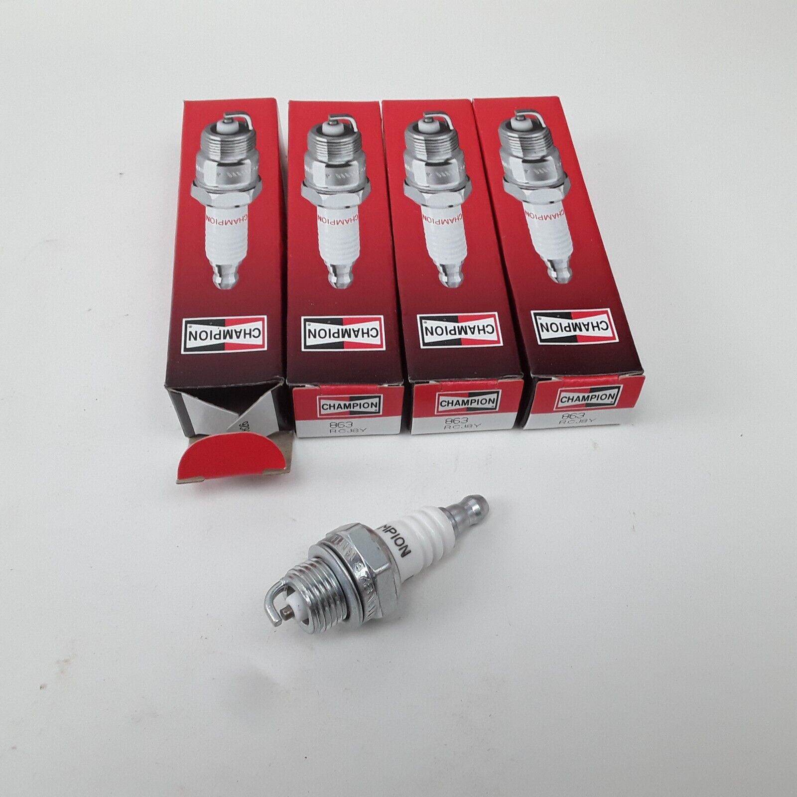 Set 4 Champion 863 RCJ8Y Standard Copper Plus Spark Plug Dependable Performance