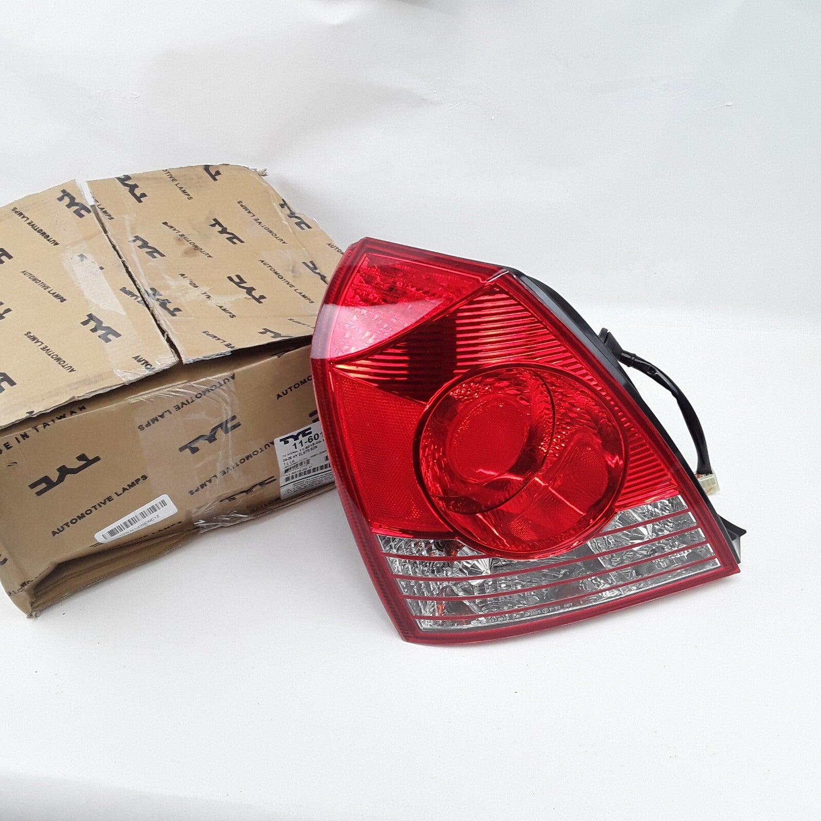 TYC 11-6018-00 Left Tail Light Assembly Fits Hyundai Elantra (2004 2005 2006)