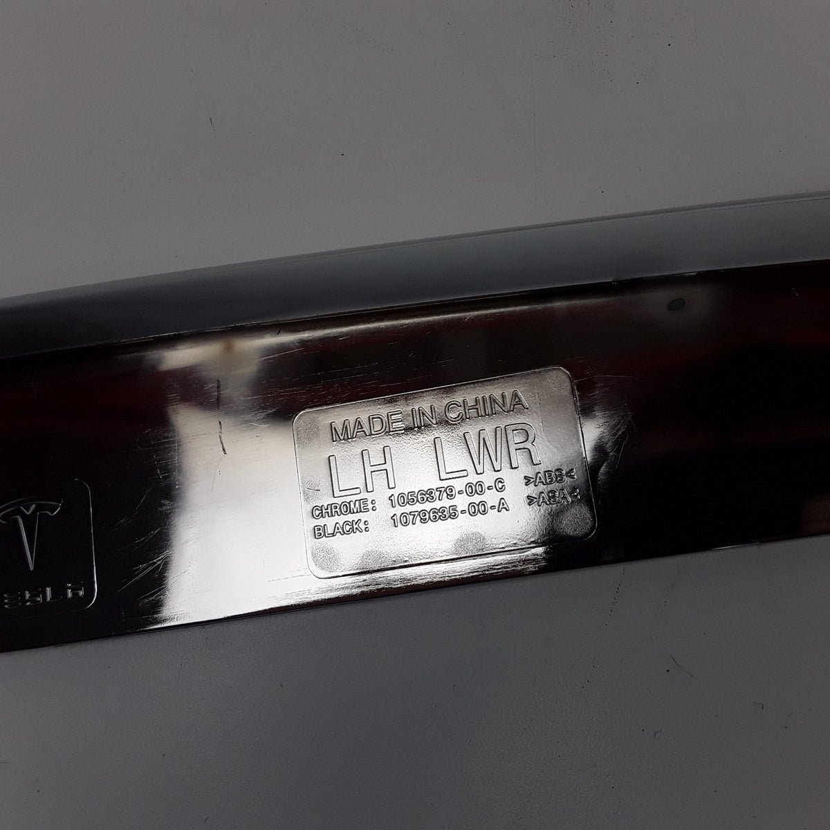 Model S 2016-2021 LH Front Lower Fog Light Spear Trim 1056379-00-C OEM