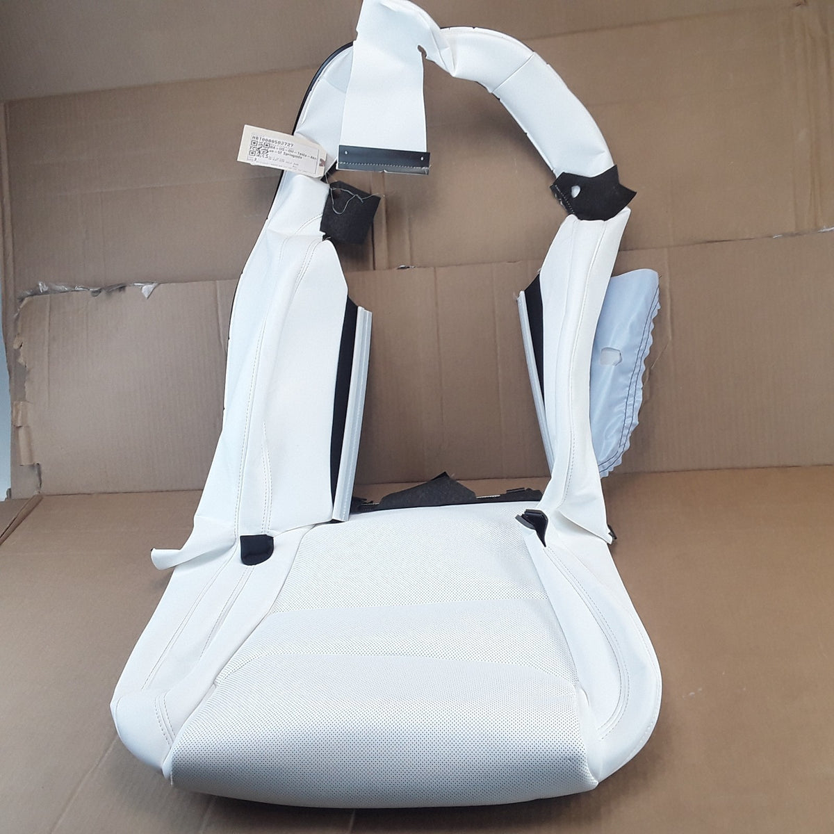 1963337-02-A Right White ISO Flag 2nd Row Seat Back Cover For Tesla Model Y OEM