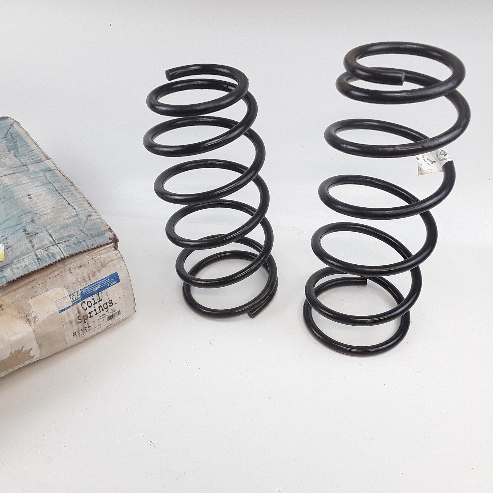Coil Spring Set Fits Dodge Grand Caravan Chrysler Town & Country (01-03, 05-07)